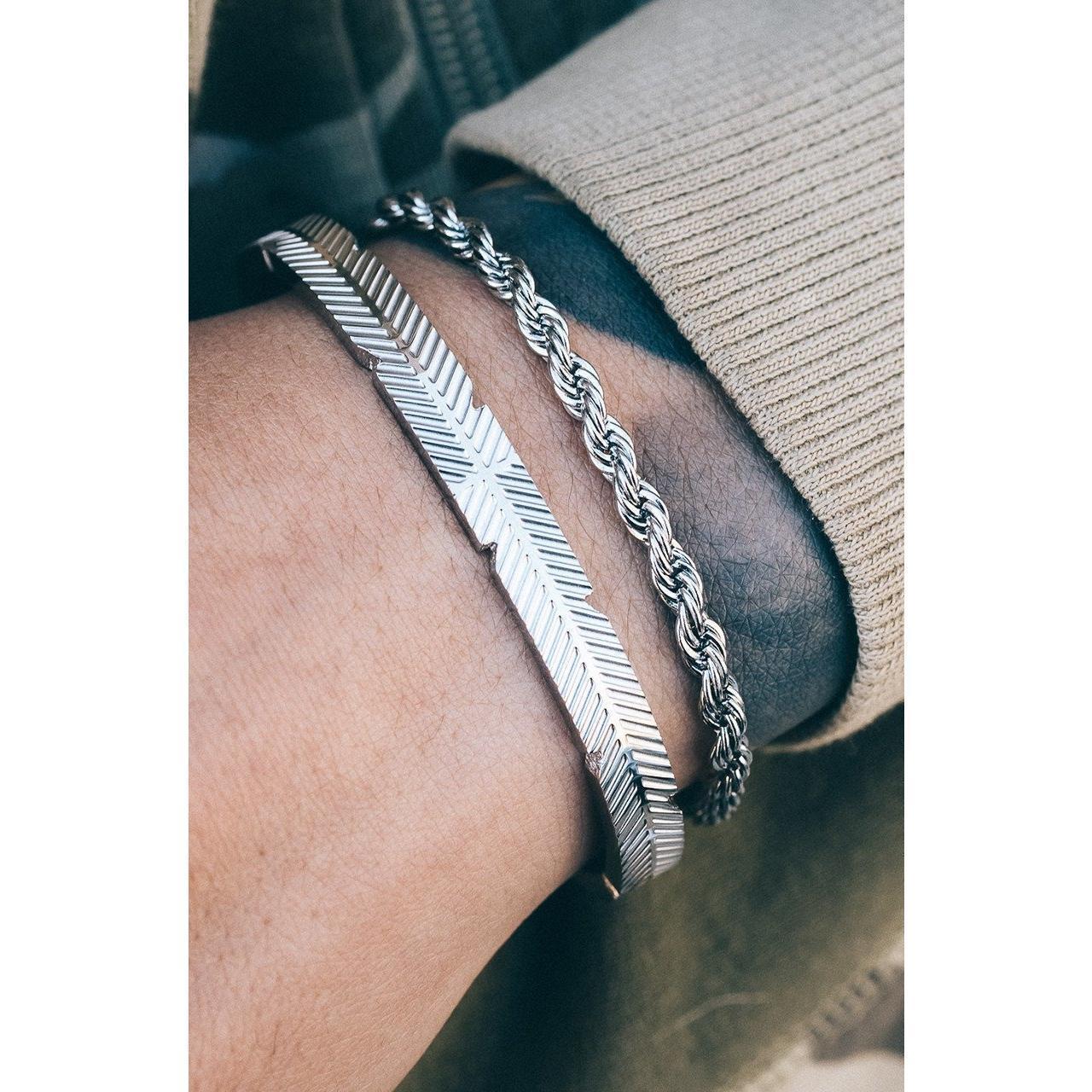 Brazalete de plumas de Mister