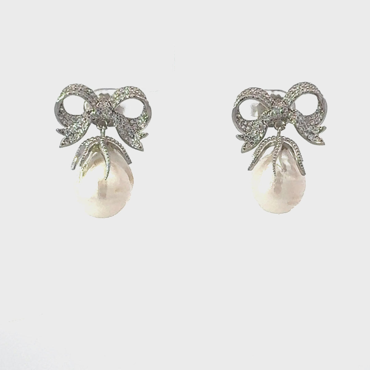 Baroque Pearl Ribbon and Bows Drop Earrings Silver