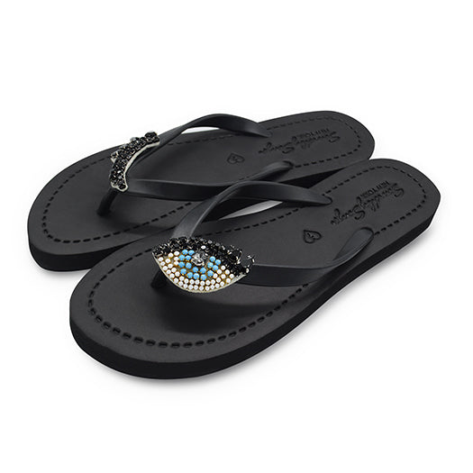 Ojos - Chanclas planas bordadas 