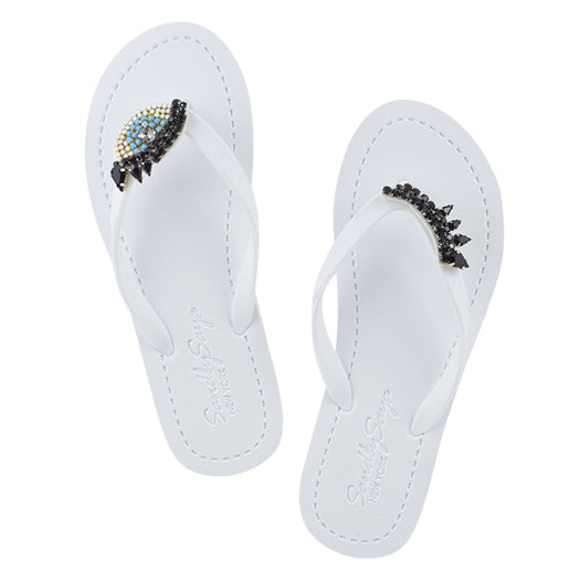 Ojos - Chanclas planas bordadas 